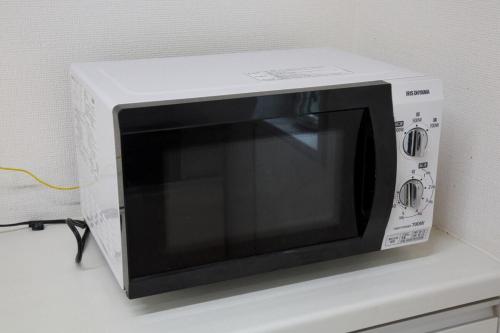 TV a/nebo společenská místnost v ubytování ちゅらパレス a