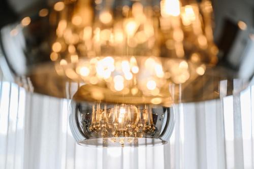 a close up of a chandelier at Hotel Schreiner in Volary