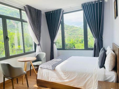 Postel nebo postele na pokoji v ubytování RUBEACH HOTEL & REROST