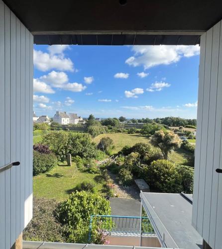a view from the balcony of a house at Penn Ar Bed & Breakfast in Plozévet