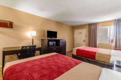 Ένα ή περισσότερα κρεβάτια σε δωμάτιο στο Econo Lodge Meridian South