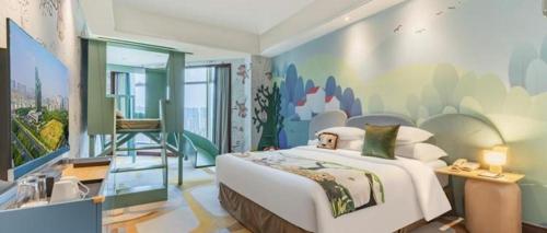 a bedroom with a large bed and a mural at New Century Grand Hotel Zhuji Yaojiang in Shaoxing
