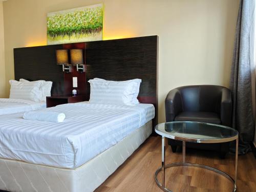 Katil atau katil-katil dalam bilik di Meetsuite at Ming Garden Residence