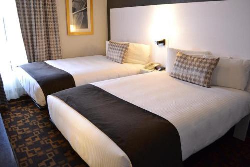 Кровать или кровати в номере Adante Hotel, a C-Two Hotel