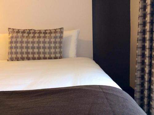 Кровать или кровати в номере Adante Hotel, a C-Two Hotel