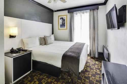Кровать или кровати в номере Adante Hotel, a C-Two Hotel