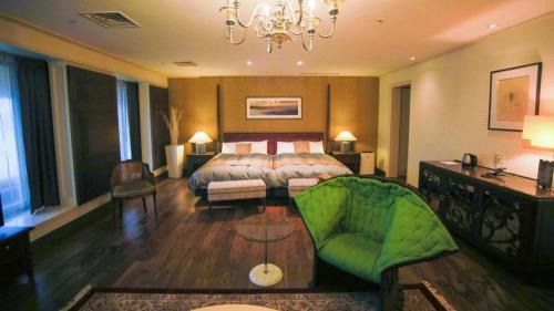 Ένα ή περισσότερα κρεβάτια σε δωμάτιο στο Hotel Kawakyu