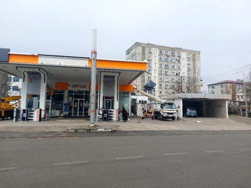 a gas station on the side of a street at квартира in Poti