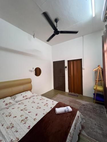 Postel nebo postele na pokoji v ubytování Cfd Homestay 2 Dungun