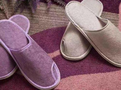 a pair of shoes sitting on top of a rug at Lavande Hotel Xi'an Longshouyuan Wenjing Road in Xi'an