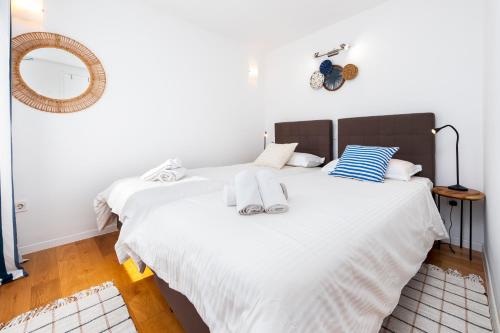 En eller flere senge i et værelse på Cobblestone Comfort in Rovinj