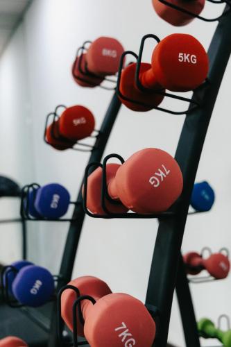a bunch of tennis balls hanging on a rack at Dara Qurtubah Hotel in Riyadh