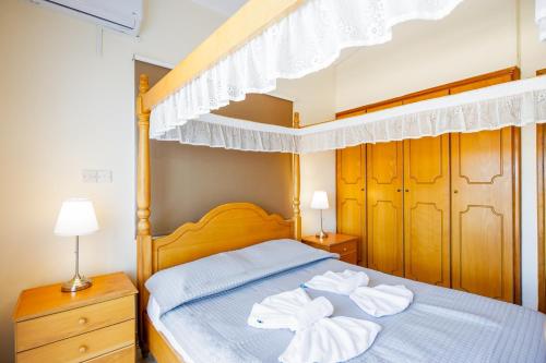 Postel nebo postele na pokoji v ubytování Villa Andreas