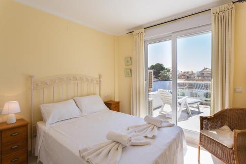 Ένα ή περισσότερα κρεβάτια σε δωμάτιο στο Surf Edu