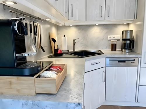 Dapur atau dapur kecil di Ferienhaus Lavendelmeer