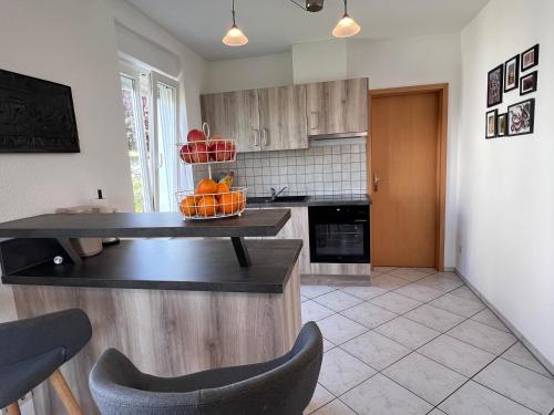 Kuchyň nebo kuchyňský kout v ubytování Trompeten-, Posaunen- & Tuba-Appartment in Stolpen