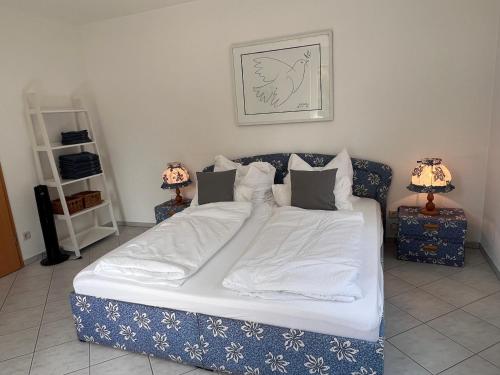 Postel nebo postele na pokoji v ubytování Trompeten-, Posaunen- & Tuba-Appartment in Stolpen