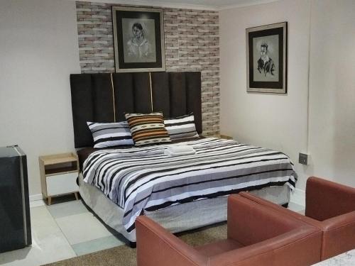 Katil atau katil-katil dalam bilik di Eneco Lodge