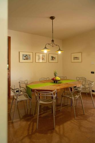 a dining room with a table and chairs at Sammit holiday home in Michelica