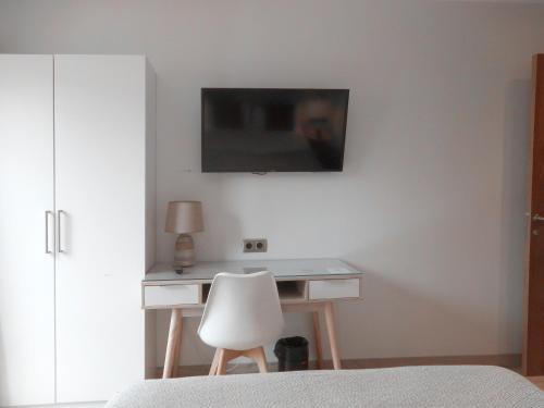 TV a/nebo společenská místnost v ubytování Hotel Lloret Ramblas
