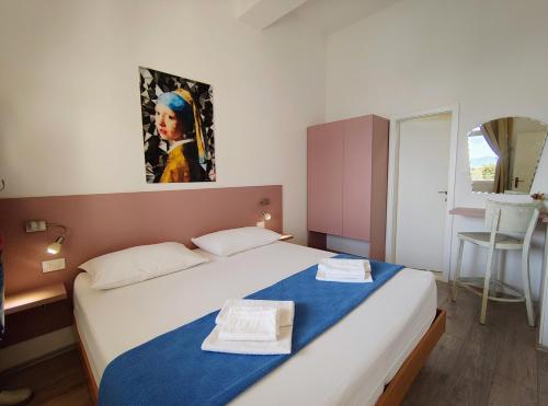 Ένα ή περισσότερα κρεβάτια σε δωμάτιο στο Apartmani Ines