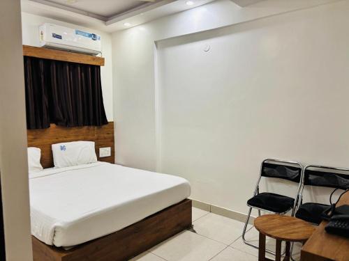 Ένα ή περισσότερα κρεβάτια σε δωμάτιο στο Hotel BG Inn