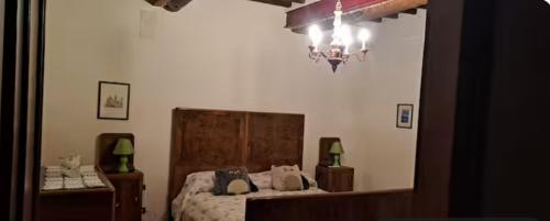 En eller flere senge i et værelse på Il Vivaio