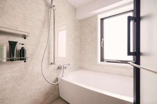 Bilik mandi di BASE LAYER HOTEL Nagoya Nishiki