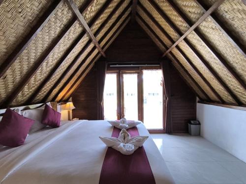 Letto o letti in una camera di Sun Grace Penida Cottage