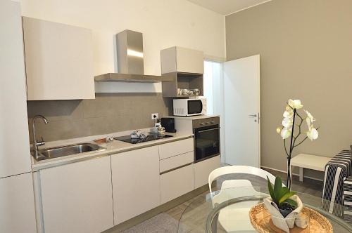 Η κουζίνα ή μικρή κουζίνα στο Italian Experience-Casa Alessia