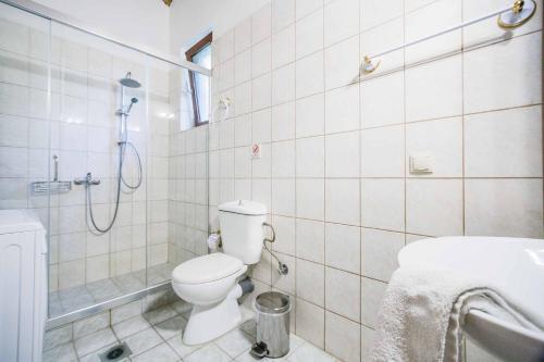 Kúpeľňa v ubytovaní Villa Segounia