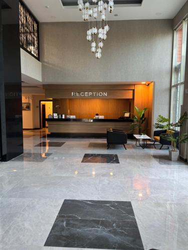 a reception area of a hotel lobby with a reception desk at Sırma Hotel - All Inclusive in Side