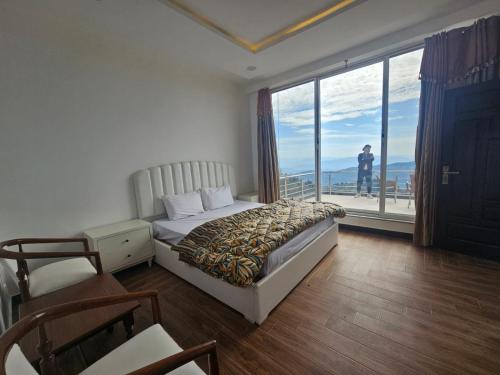 Кровать или кровати в номере Mount Vista Luxury Apartments