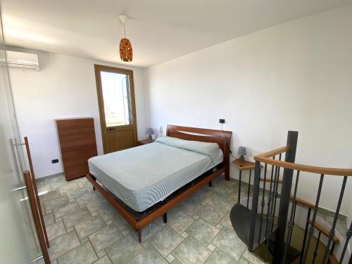 Postel nebo postele na pokoji v ubytování Il faro