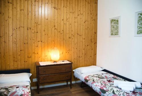Ένα ή περισσότερα κρεβάτια σε δωμάτιο στο Tre Pini Retreat