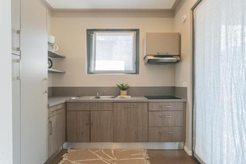 Nhà bếp/bếp nhỏ tại Mulino Vista Lake by Rent All Como