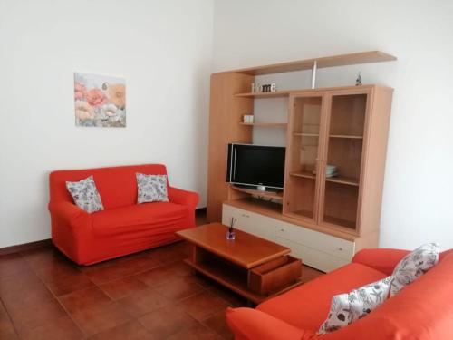 TV a/nebo společenská místnost v ubytování Casa Gioia