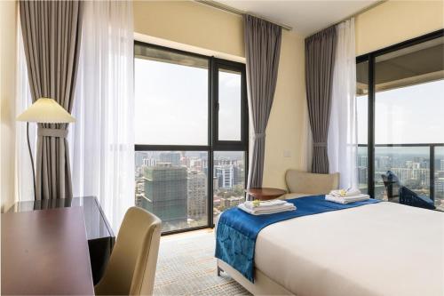 Postel nebo postele na pokoji v ubytování GTC Elephant 2 bed by YourHost, Nairobi