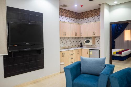 Kuchyň nebo kuchyňský kout v ubytování شقق أهلين للشقق المخدومة