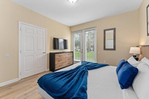 En eller flere senge i et værelse på 3 Suites Near Universal Resort Intl Drive