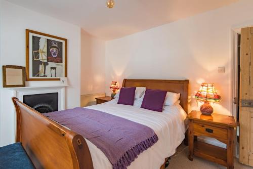 En eller flere senge i et værelse på Oyster Cottage by Keepers Cottages