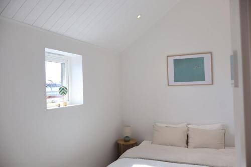 Katil atau katil-katil dalam bilik di Penthouse over the harbour