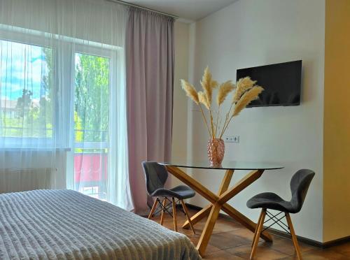 TV a/nebo společenská místnost v ubytování TREND HOUSE Apartments