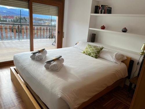 Postel nebo postele na pokoji v ubytování Apartamento Puigcerdà ideal familias