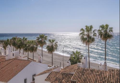 5 Chaparil Beach, Flat 3 with Sea Views