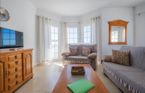 5 Chaparil Beach, Flat 3 with Sea Views