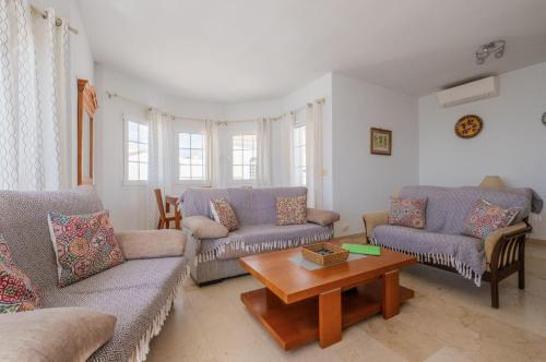 5 Chaparil Beach, Flat 3 with Sea Views