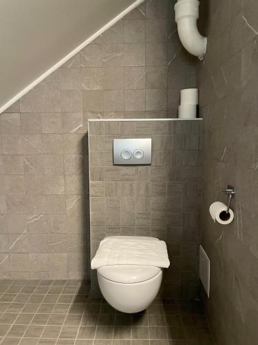 Ванная комната в Unique Hotel