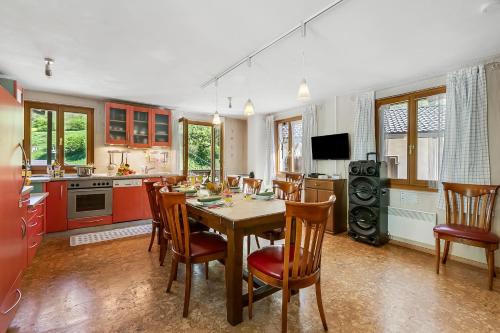 a kitchen and dining room with a table and chairs at Casa Andy 1 Val Lavizzara - Happy Rentals in Al Piano