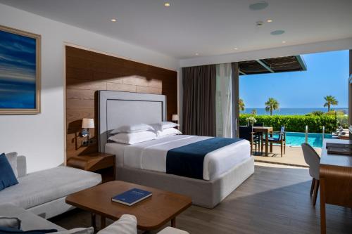 Katil atau katil-katil dalam bilik di Nana Princess Suites Villas & Spa